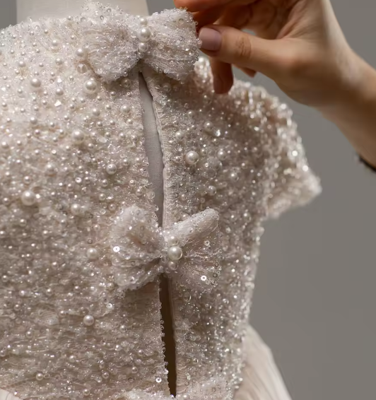 The Celestial Grace Pearl Gown