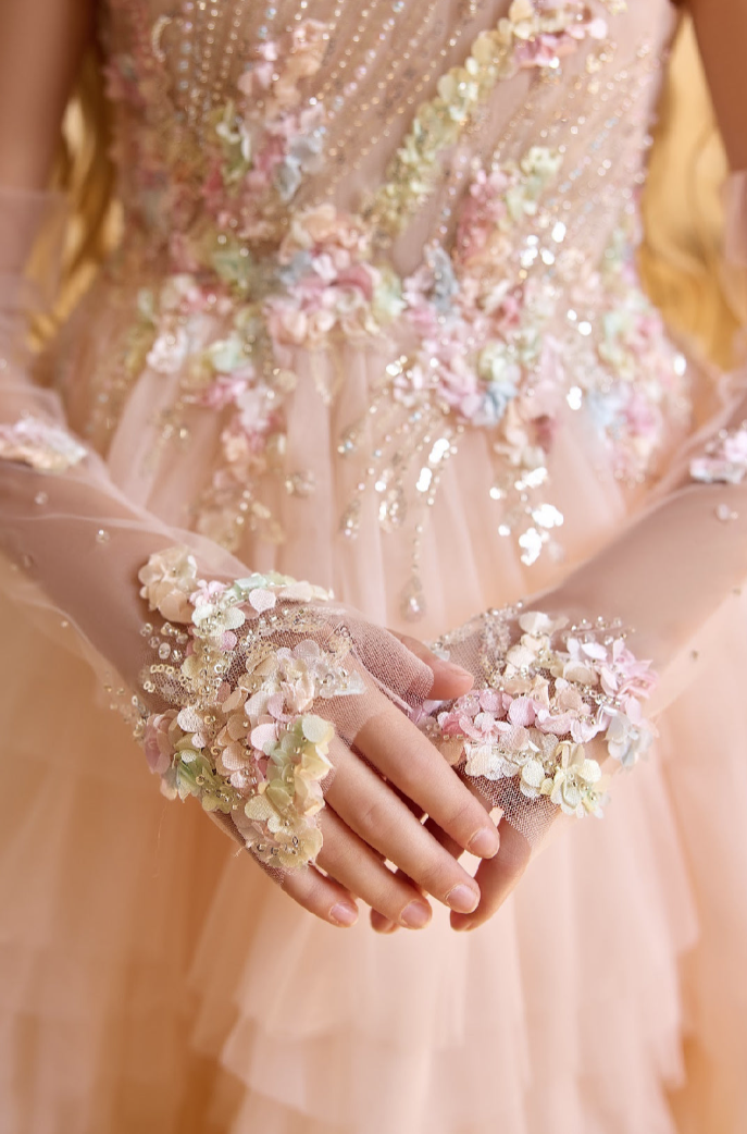 Hand-applied lace, beading, and satin finishing