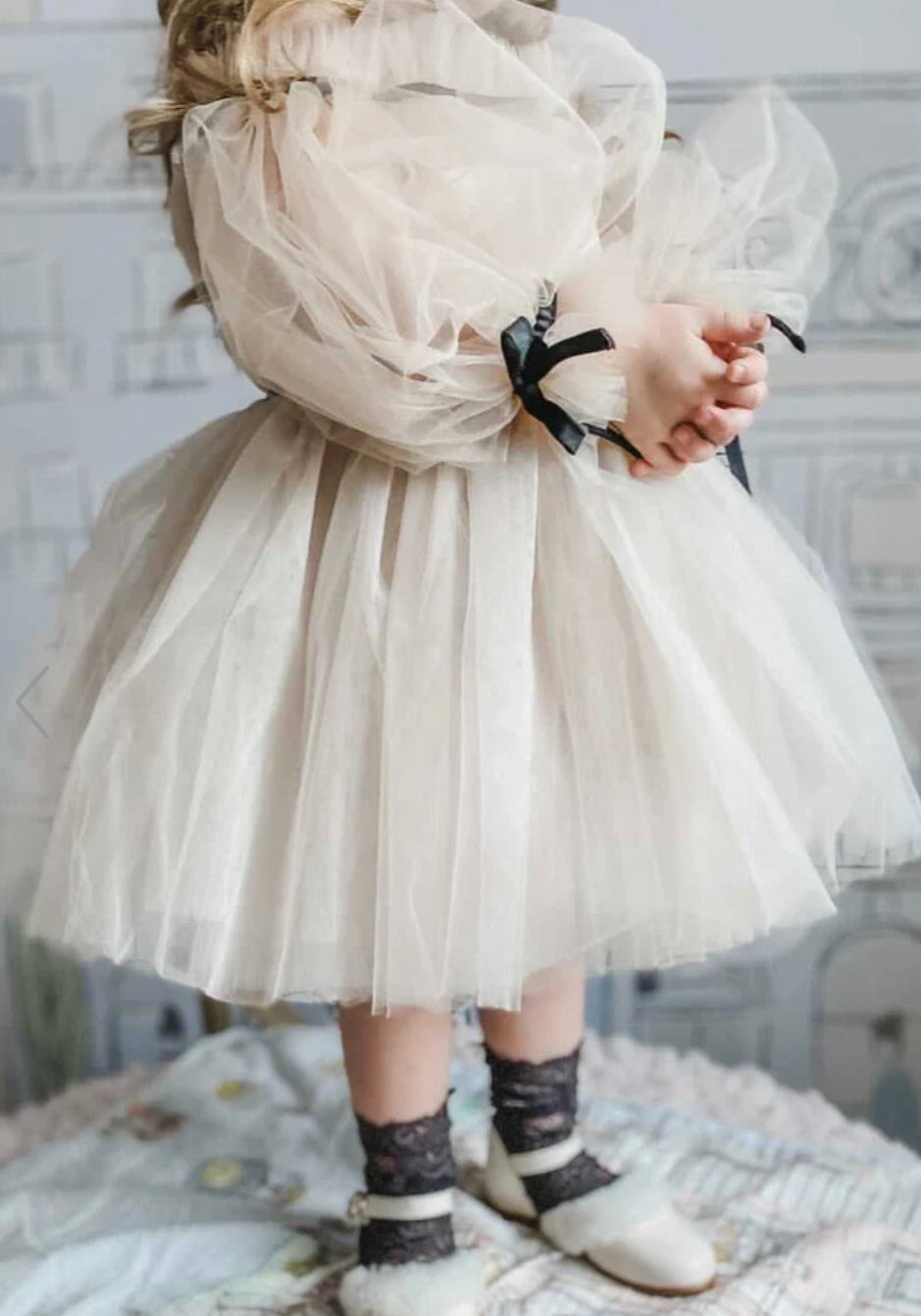 Elegant Off-Shoulder Tulle Dress with Black Ribbon Accents