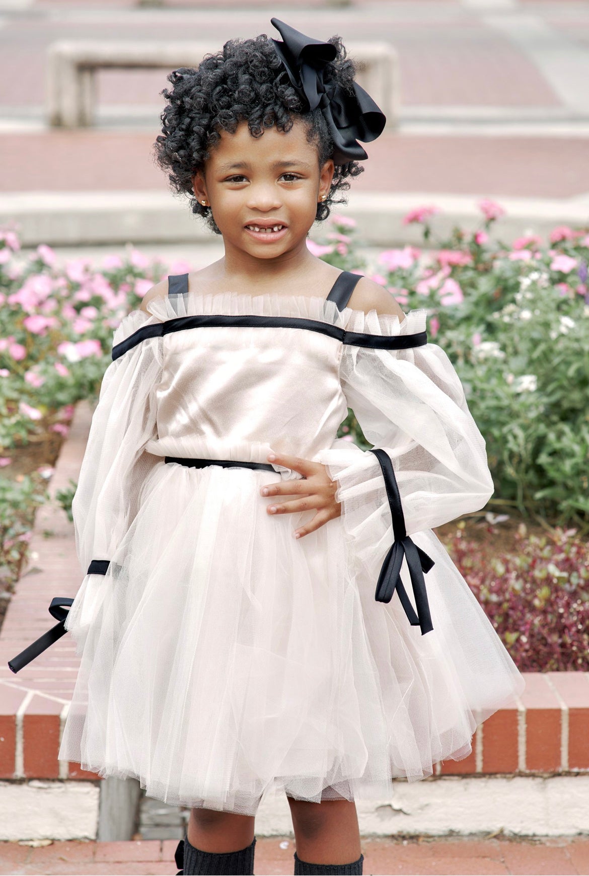 Elegant Off-Shoulder Tulle Dress with Black Ribbon Accents