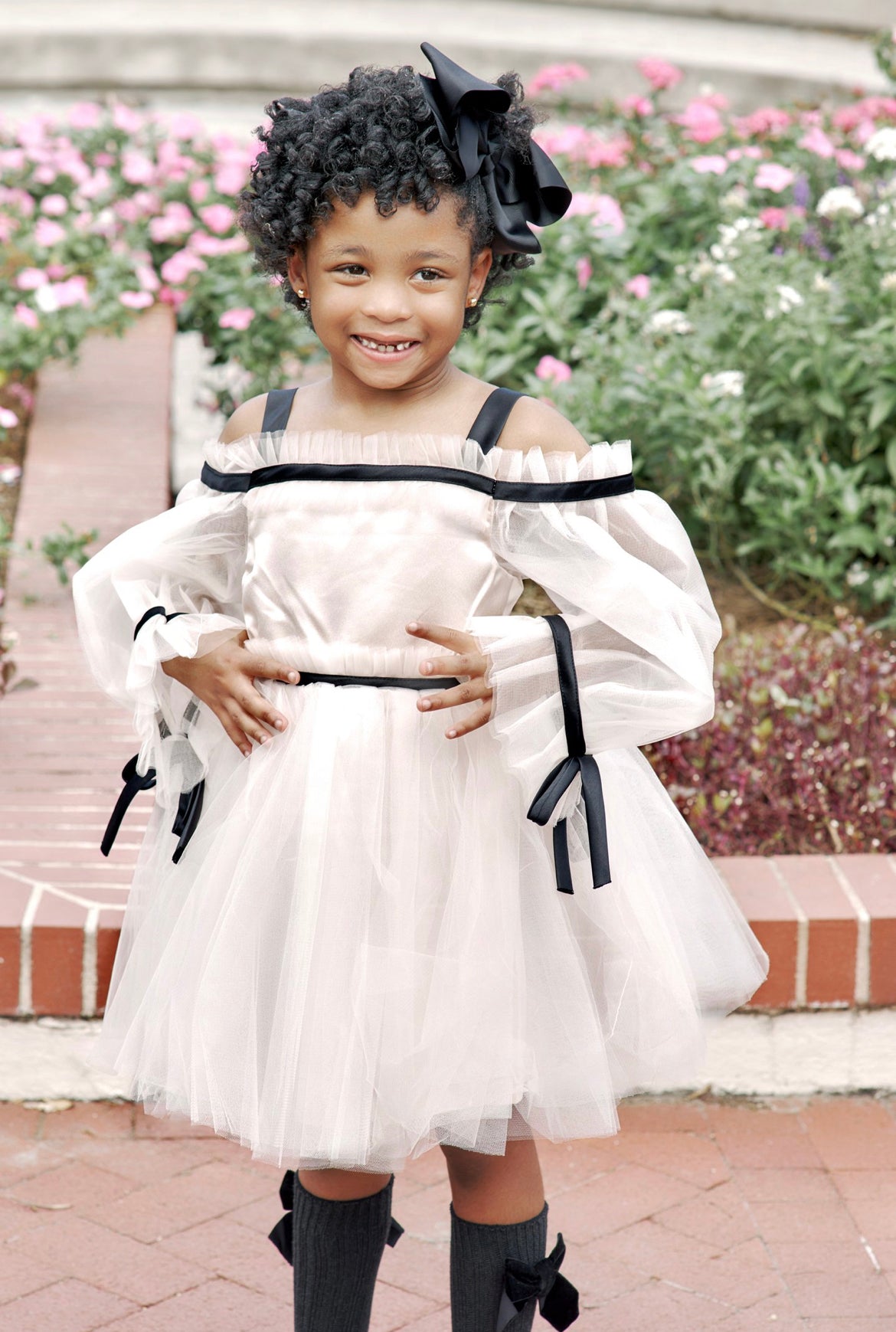 Elegant Off-Shoulder Tulle Dress with Black Ribbon Accents